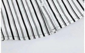 طقم ولادي شورت مع قميص مخطط نصف فيست